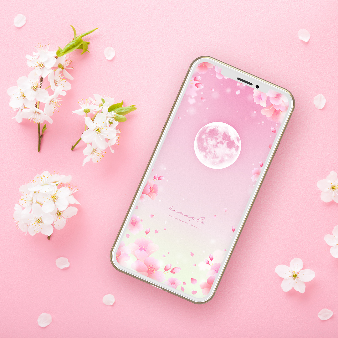 【春らんまん桜満月】風に舞う花びらとピンク色の空に光輝く満月！さくらムーンのスマホ壁紙
